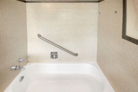 We saved this homeowner thousands by refinishing the tub and surrounding tile!